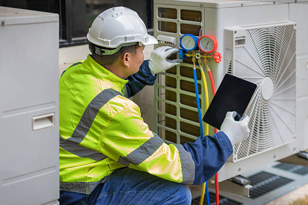 Professional Heat Pump Repair technician working in Uxbridge, MA